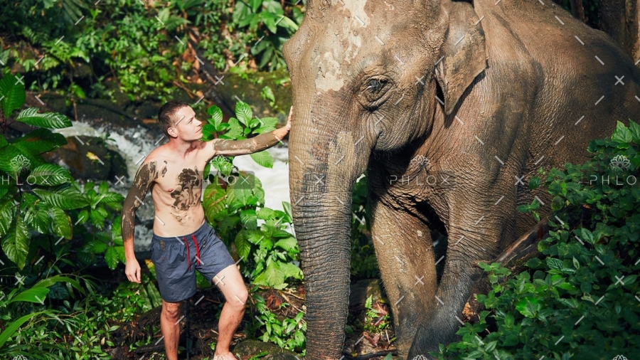 demo-attachment-25-traveler-with-elephant-PYYEKQD